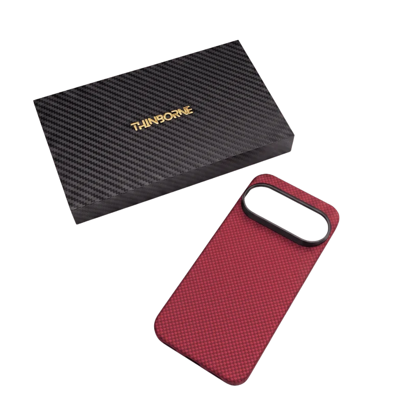 Crimson Pixel 11 Pro XL Case paired with Thinborne carbon fiber gift box. Premium aerospace aramid packaging for daily use and gifting.
