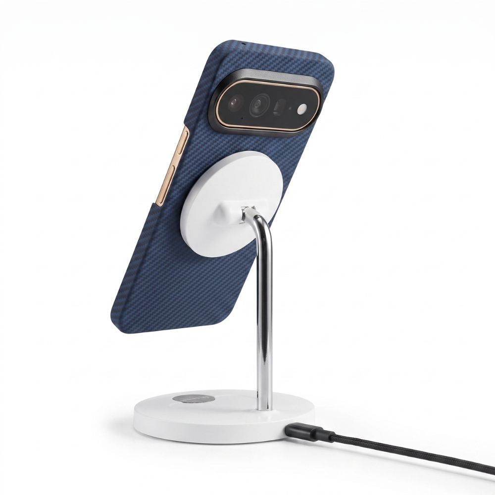 Navy Pixel 11 Pro aramid fiber case attached to magnetic wireless charging stand, product demonstration shot