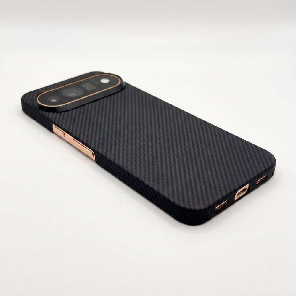 Angled shot showing bottom port cutouts of Pixel 11 Pro XL black aramid fiber protective phone case