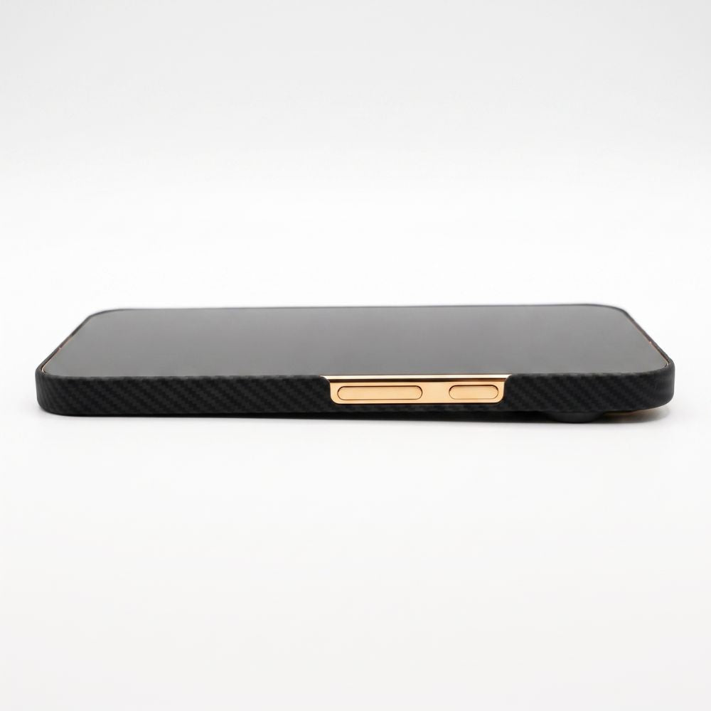 Side profile close‑up of Pixel 11 Pro XL aramid fiber case, gold metal buttons, ultra‑thin fit