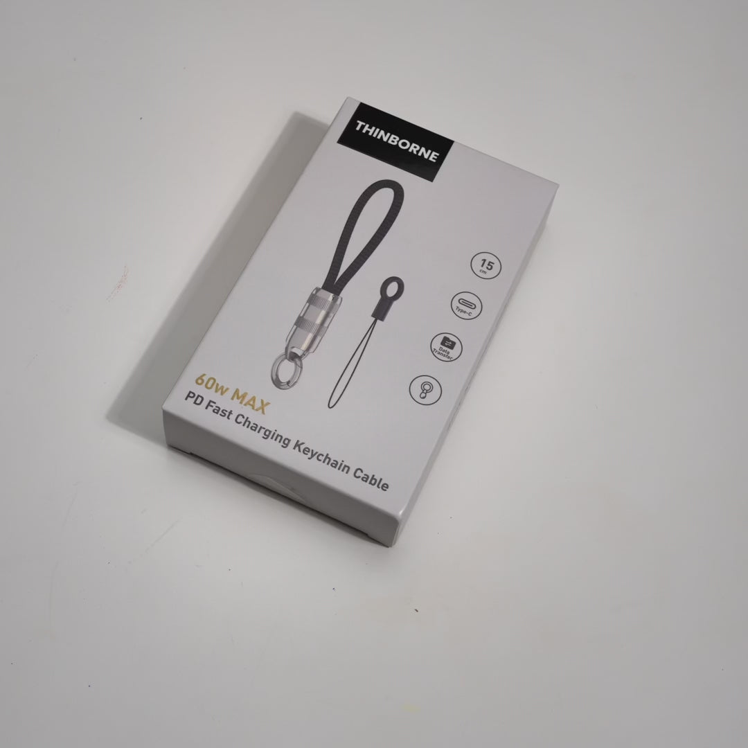 Ultra Short Keychain Cable product showcase video. View the compact portable braided charging cable with detachable metal keyring and premium packaging.