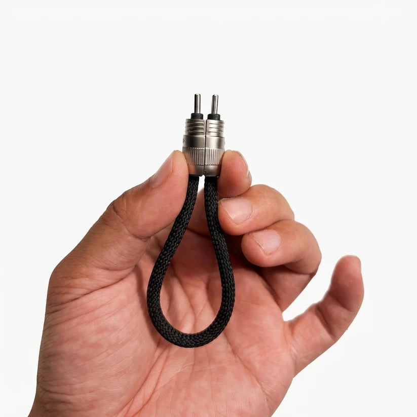 Hand holding Ultra Short Keychain Cable, tiny braided portable charging cable with metal connector