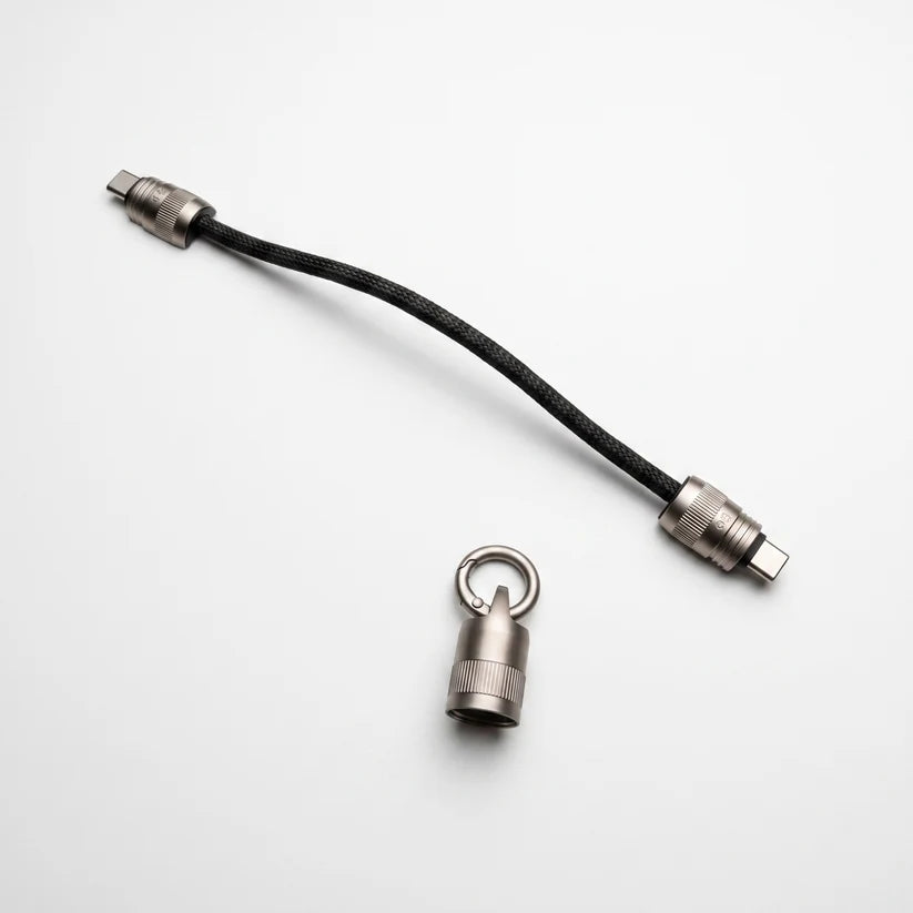 Ultra Short Keychain Cable separated components, braided cable and detachable metal key ring, flat lay shot
